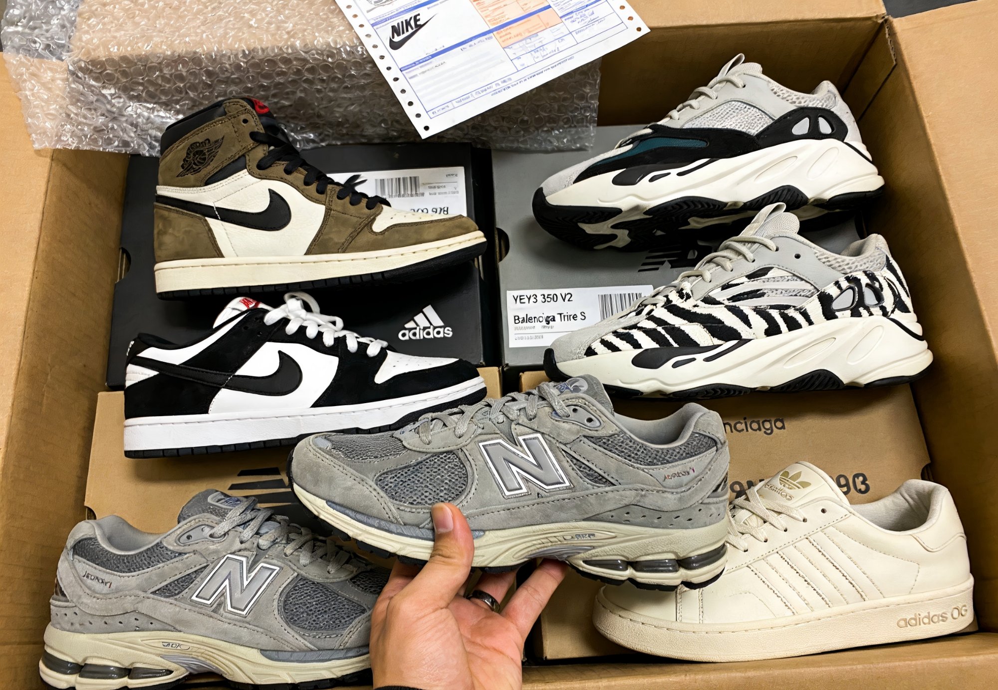 Maison Margiela shoe collection with boxes — rep finds spreadsheet 2026